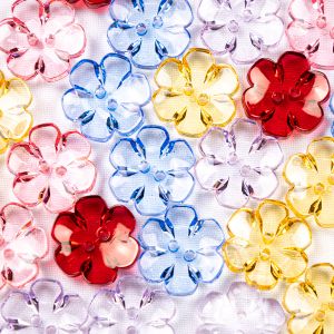 Flower-shaped button 18 mm / Different shades