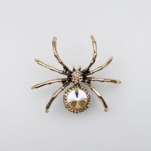 Brooch / Spider with gemstone / gold